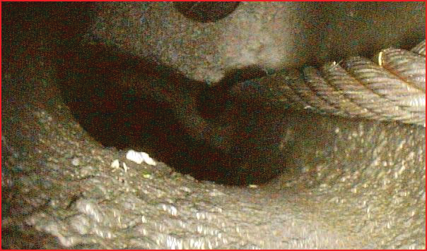 Miss-routed cable inside in the center of the column assembly. Control movement caused it to cut into the magnesium casting.