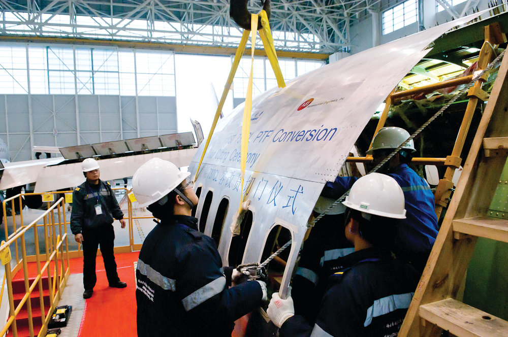 Boeing Shanghai Celebrates Door Cutting Completion for First Boeing 737-300 PTF Conversion