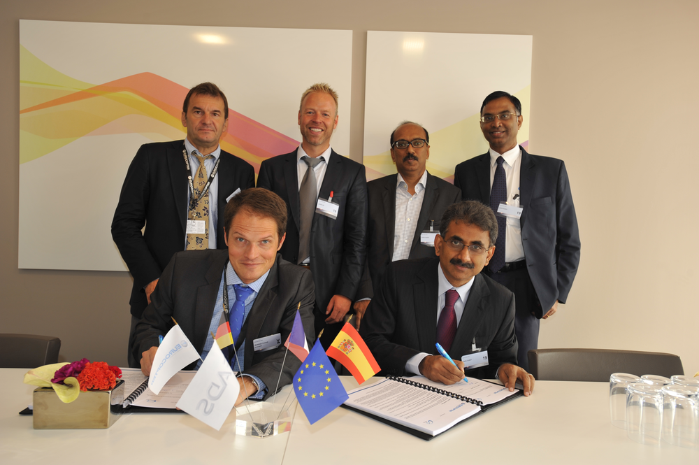Matthieu Louvot, Senior Vice President of Support and Services, Eurocopter and P. R. Venketrama Raja, Vice Chairman & Managing Director, Ramco Systems signing the partnership agreement in the presence of Rick Peeks and Antoine Rivet from Eurocopter and Virender Aggarwal and Ranganathan Jagannathan from Ramco Systems.