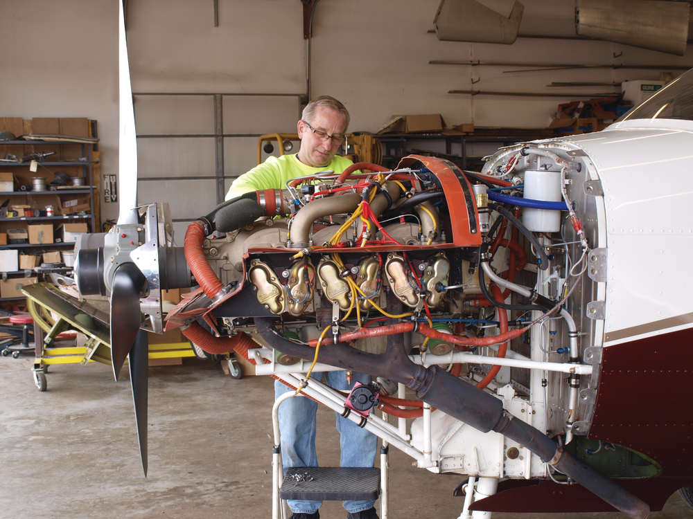 Lyle Kiecker with one of the many Navion aircraft maintained at Sierra Hotel Aero.