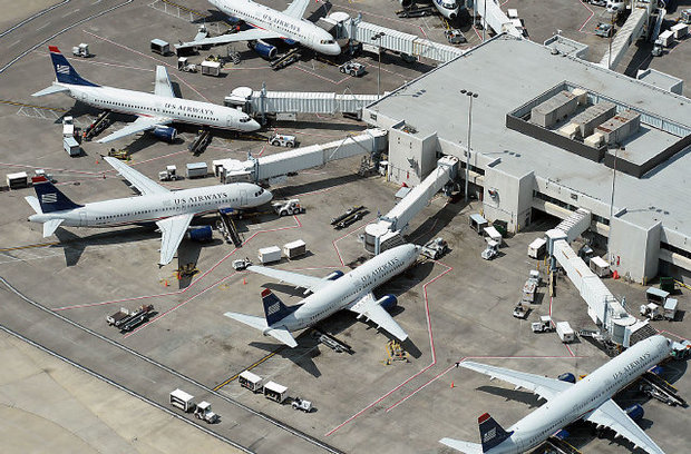 US Airways has said it doesn't have a position as to who runs the airport. The airline has said it only wants management to remain committed to keeping Charlotte Douglas a low-cost airport.