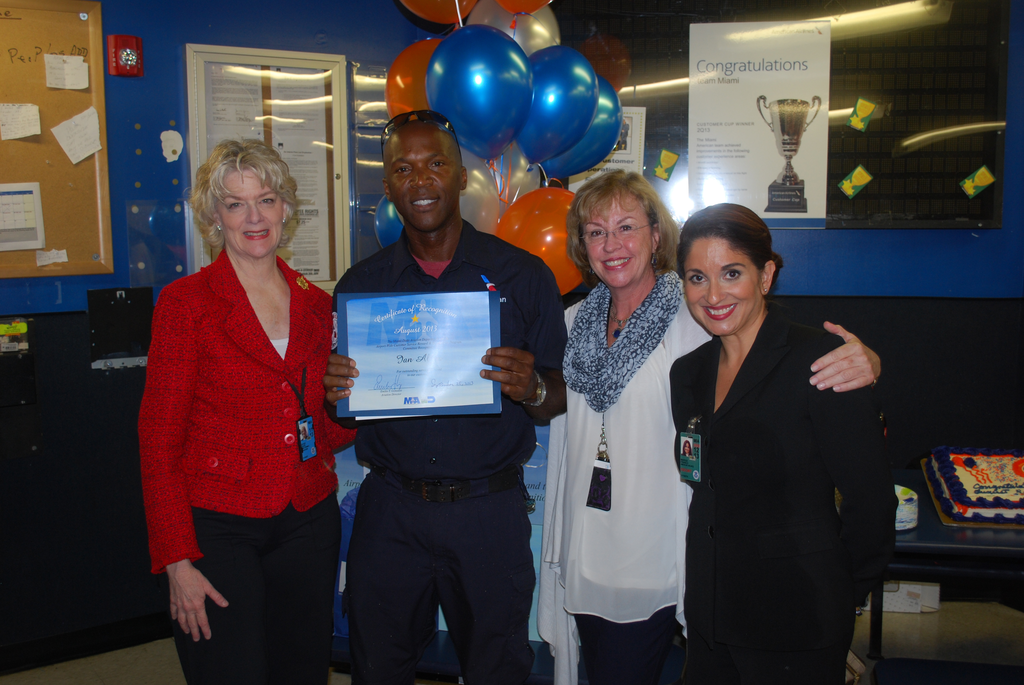 Members of MIA's Rewards and Recognition Committee and American Airlines co-workers surprised Allen on the job on September 25 with a recognition celebration and presented him with his Employee of the Month certificate of appreciation.