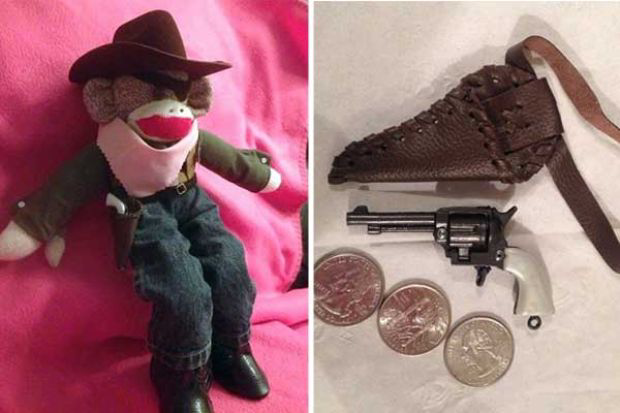 Owner says doll's 2-inch gun weighs less than an ounce. Its trigger and hammer move, but the barrel is solid.
