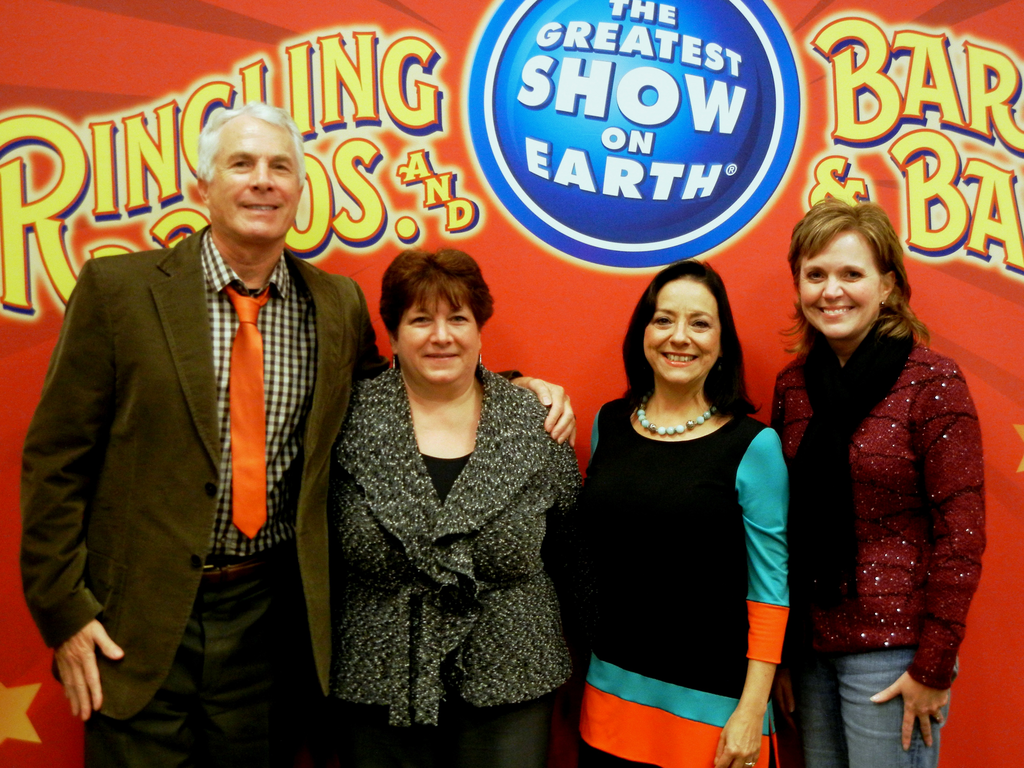 The PPG Industries Foundation has donated $6,000 to TICKETS FOR KIDS Charities (TFK), a Pittsburgh-based nonprofit organization that distributes tickets to arts, cultural, educational, family entertainment and sporting events through social-service agencies nationwide to at-risk children and low-income families. PPG Industries Foundation Executive Director Sue Sloan (second from left) and screening committee member Michelle Welch (far right), who is also business director, TESLIN substrate, for PPG Industries, recently attended a TFK event in Pittsburgh along with TFK Board Chairman and President Bruce B. Weiner and TFK Executive Director Rosemary Mendel. The grant will help increase TFK offerings in West Coast communities where PPG's aerospace business has operations.