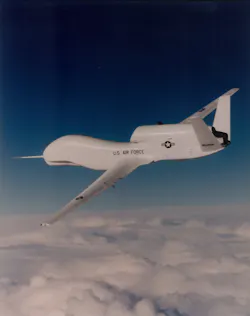 A historical look at the first Global Hawk (AV1) during its maiden flight over Edwards Air Force Base, Calif., on Feb. 28, 1998. AV1 has made history again with its 100th flight in support of NASA environmental research. A historical look at the first Global Hawk (AV1) during its maiden flight over Edwards Air Force Base, Calif., on Feb. 28, 1998. AV1 has made history again with its 100th flight in support of NASA environmental research.