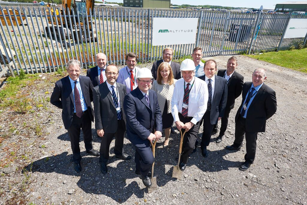 The gentlemen in hard hats are David Poole, Facilities Manager and Steve Cox, Head of Manufacturing, at AIM Altitude.