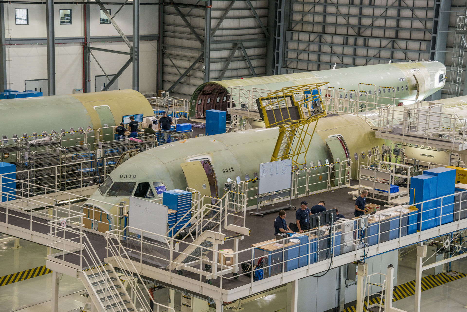 Major components of the first two aircraft to be assembled at the Airbus U.S. Manufacturing Facility are shown in the main final assembly hangar at this American A320 Family production site.