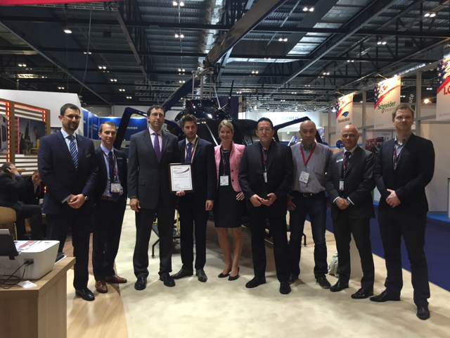 Caption: Glen Isbell, Bell Helicopter, SVP Customer Support & Services with Dennis Beese, CEO &ndash; Agrarflug Helilift and their teams.