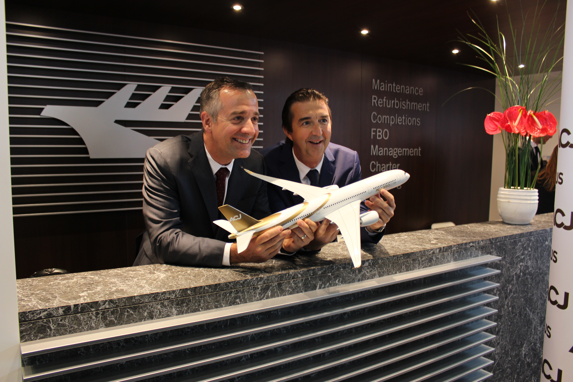 Jet Aviation Group President Rob Smith, left, at EBACE 2016 with Airbus Corporate Jets (ACJ) Managing Director Benoit Defforge