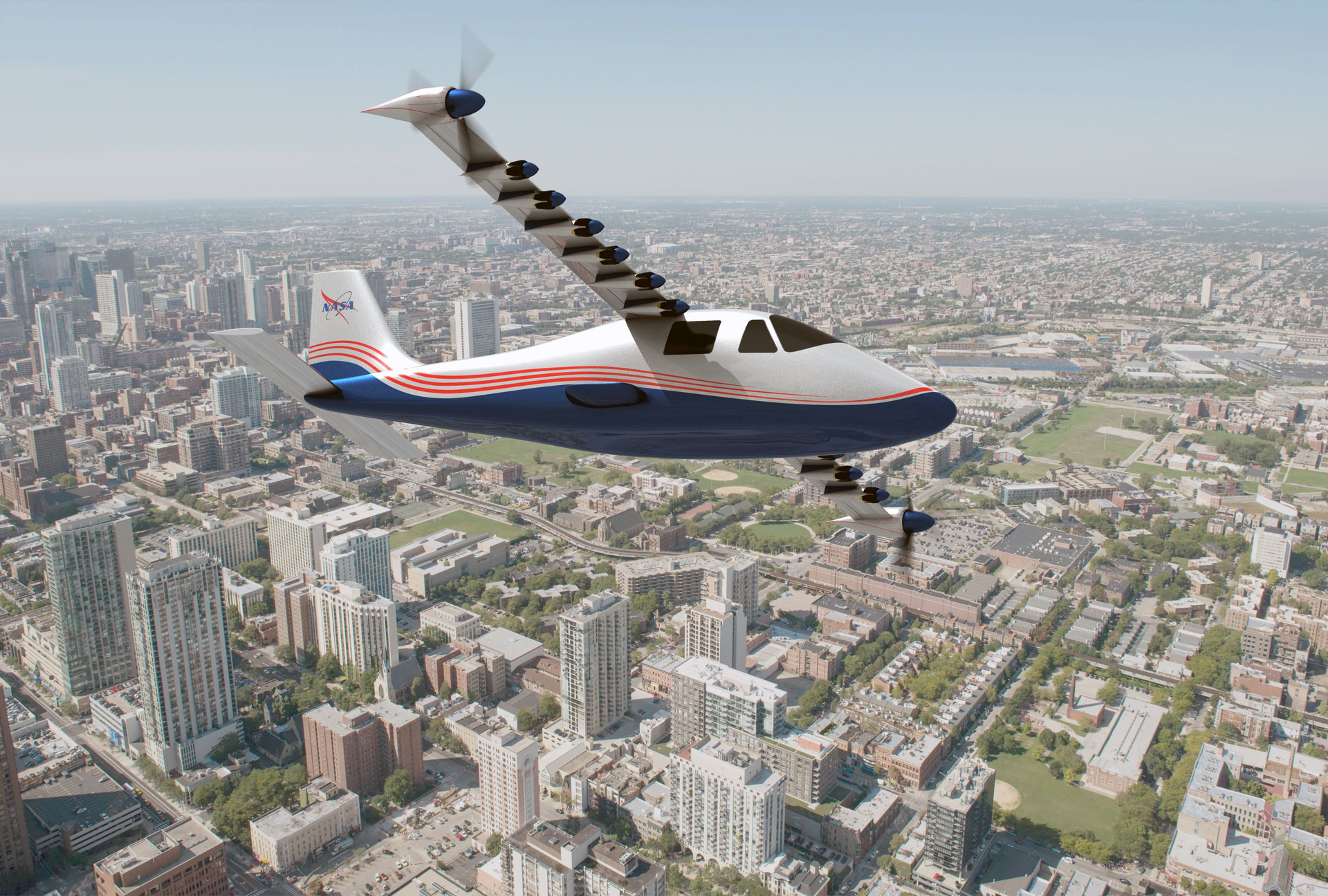This artist's concept of NASA's X-57 Maxwell aircraft shows the plane's specially designed wing and 14 electric motors. NASA Aeronautics researchers will use the Maxwell to demonstrate that electric propulsion can make planes quieter, more efficient and more environmentally friendly.
