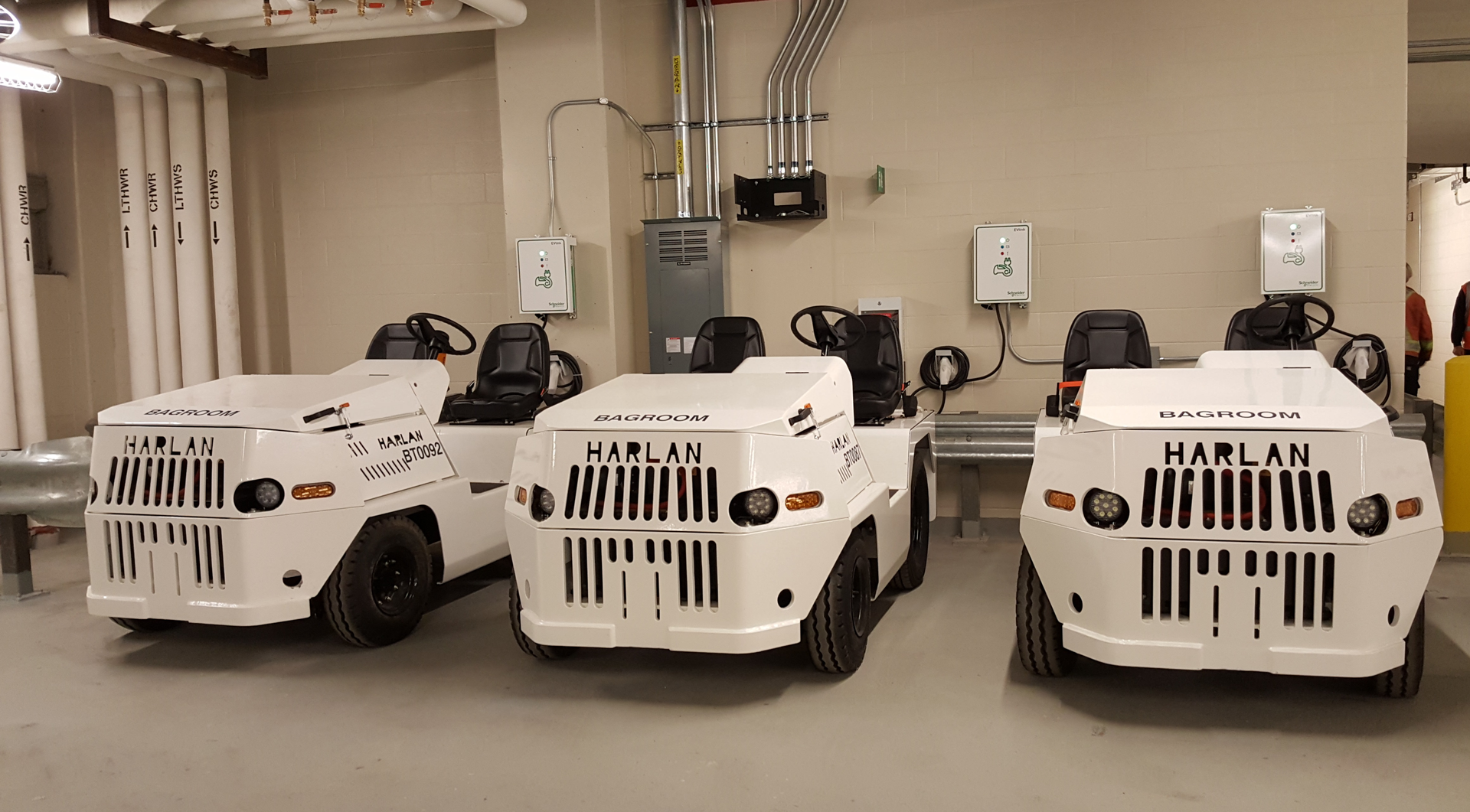 Harlan Global Manufacturing worked with WestJet and Air Canada to replace diesel tractors with lithium-powered electric vehicles.