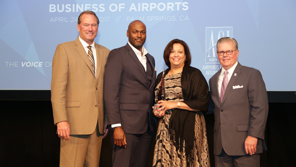 Deputy Director of Finance & Administration Antonio Strong (second from left) and Amber Gooding, assistant director of business diversity development, represented the Airport in receiving the ACI-NA Inclusion Champion Award on April 26, 2017.