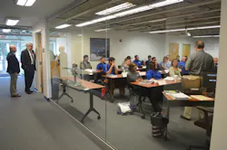 Dean Robert Cody, President John Cox (L-R) observing the classroom at CCCC. Dean Robert Cody, President John Cox (L-R) observing the classroom at CCCC.