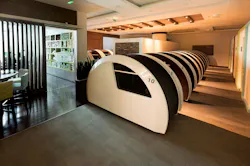 The lounge contains sleeping pods for passengers. The lounge contains sleeping pods for passengers.