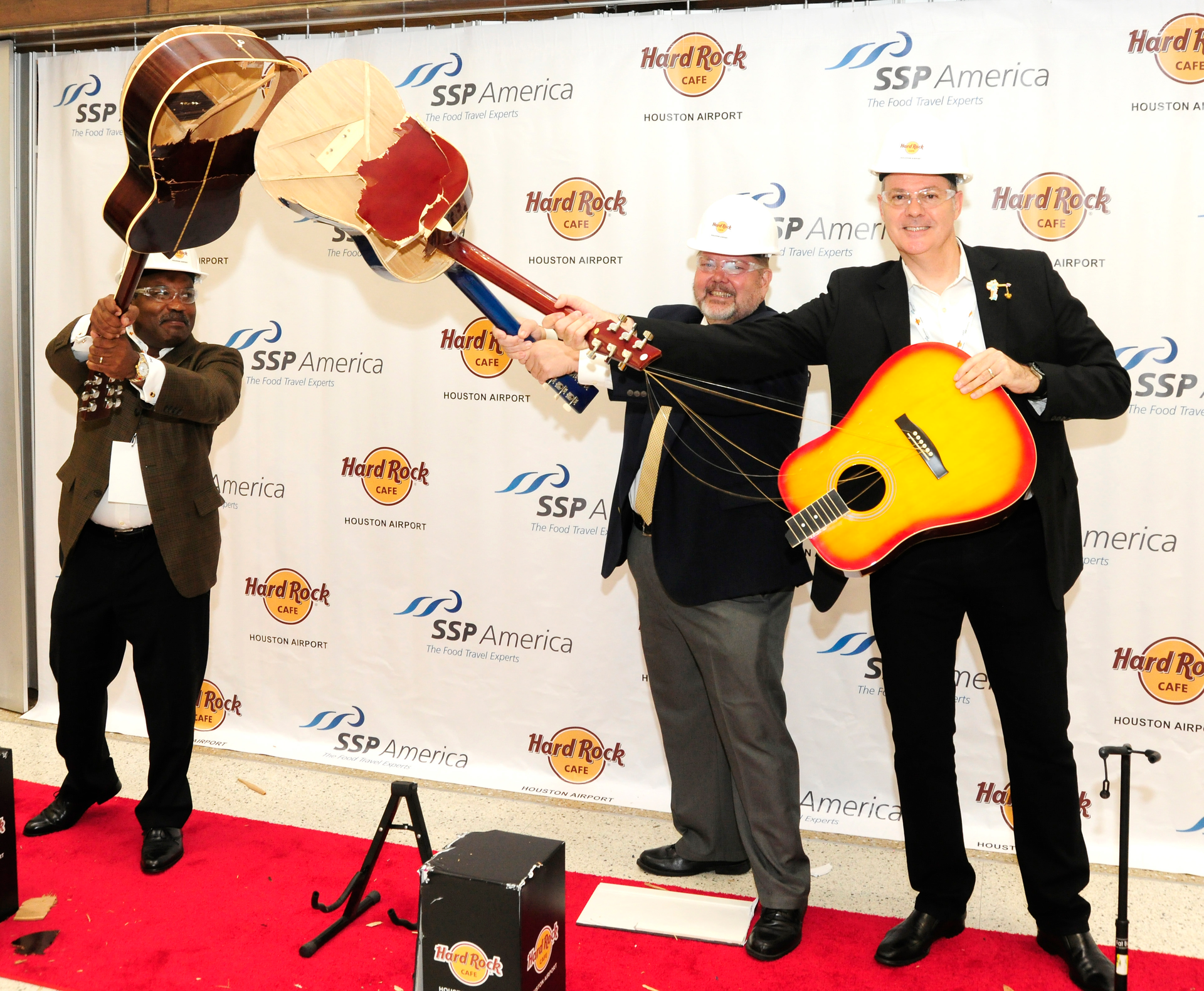 Capping the rollout of an expansive and exciting new lineup of dining and shopping choices at Bush Airport, representatives from the airport system, Hard Rock International and operator and manager, SSP America, were on hand and capped the celebration with a ceremonial &ldquo;guitar smash.&rdquo;