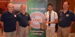 NDSU Computer Science student and team lead Abdullah Almosalami receives the team's award at the International Aerial Robotics Competition. NDSU Computer Science student and team lead Abdullah Almosalami receives the team's award at the International Aerial Robotics Competition.