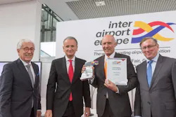 Second from right Mr Remo Brunschwiler, CEO of Vanderlande, accepting the award. Second from right Mr Remo Brunschwiler, CEO of Vanderlande, accepting the award.