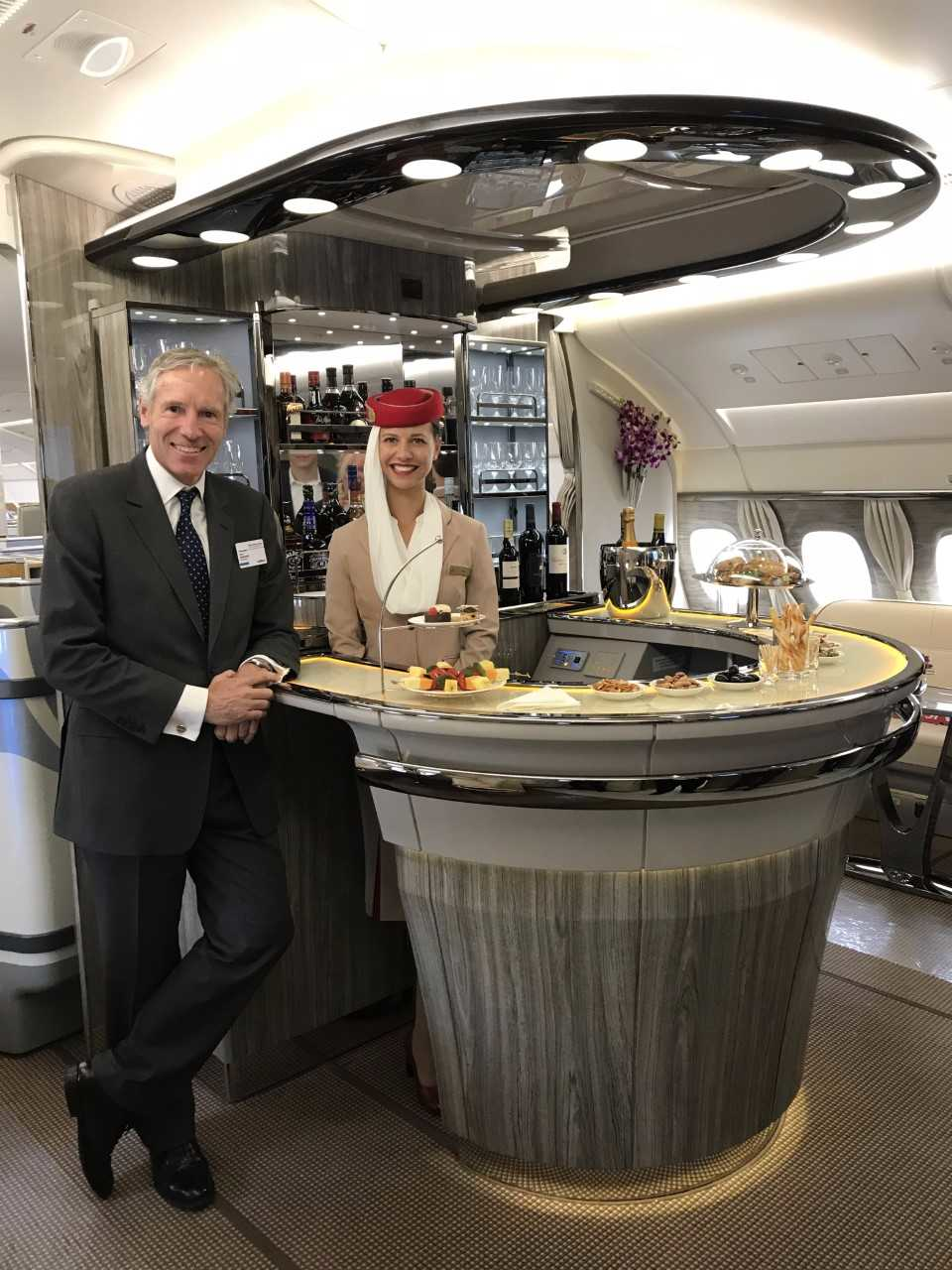 Mark Edwards, CEO of AIM Altitude, stood at the Horseshoe Bar at the celebration event in Hamburg.