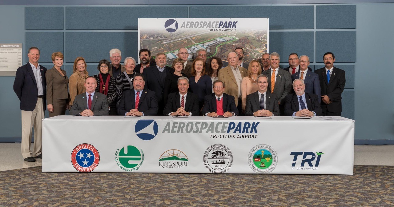 Representatives of the TCAA; the Cities of Bristol, Kingsport and Johnson City, Tennessee; and Sullivan County and Washington County, Tennessee join together to sign the newly passed agreement to support the development of Aerospace Park.