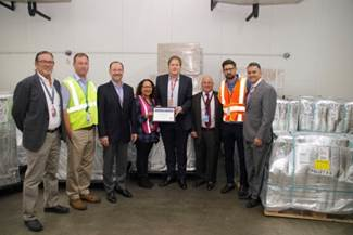 WFS representatives receive their CEIV certificate from: Ronald Schaefer, IATA Assistant Director (center); Joseph Napoli, MDAD Chief of Staff (right of center); and Jimmy Nares, MDAD Marketing Section Chief (far right).