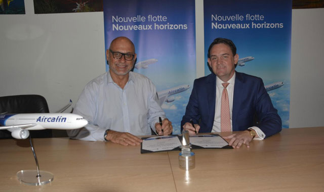 Didier Tappero (left) and Ewen McDonald sign the Trent 7000 contract.