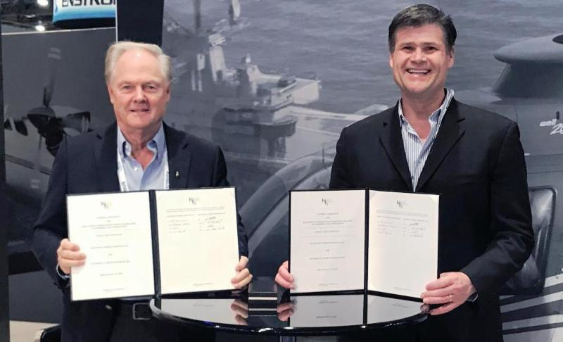 Richard McConn, chairman and CEO of M International (L) and Fred Buttrell, CEO of Air Medical Group Holdings.