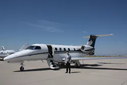 Company President and CEO John Owen stands in front of an Executive AirShare Embraer Phenom 300 at Centennial Airport. Company President and CEO John Owen stands in front of an Executive AirShare Embraer Phenom 300 at Centennial Airport.