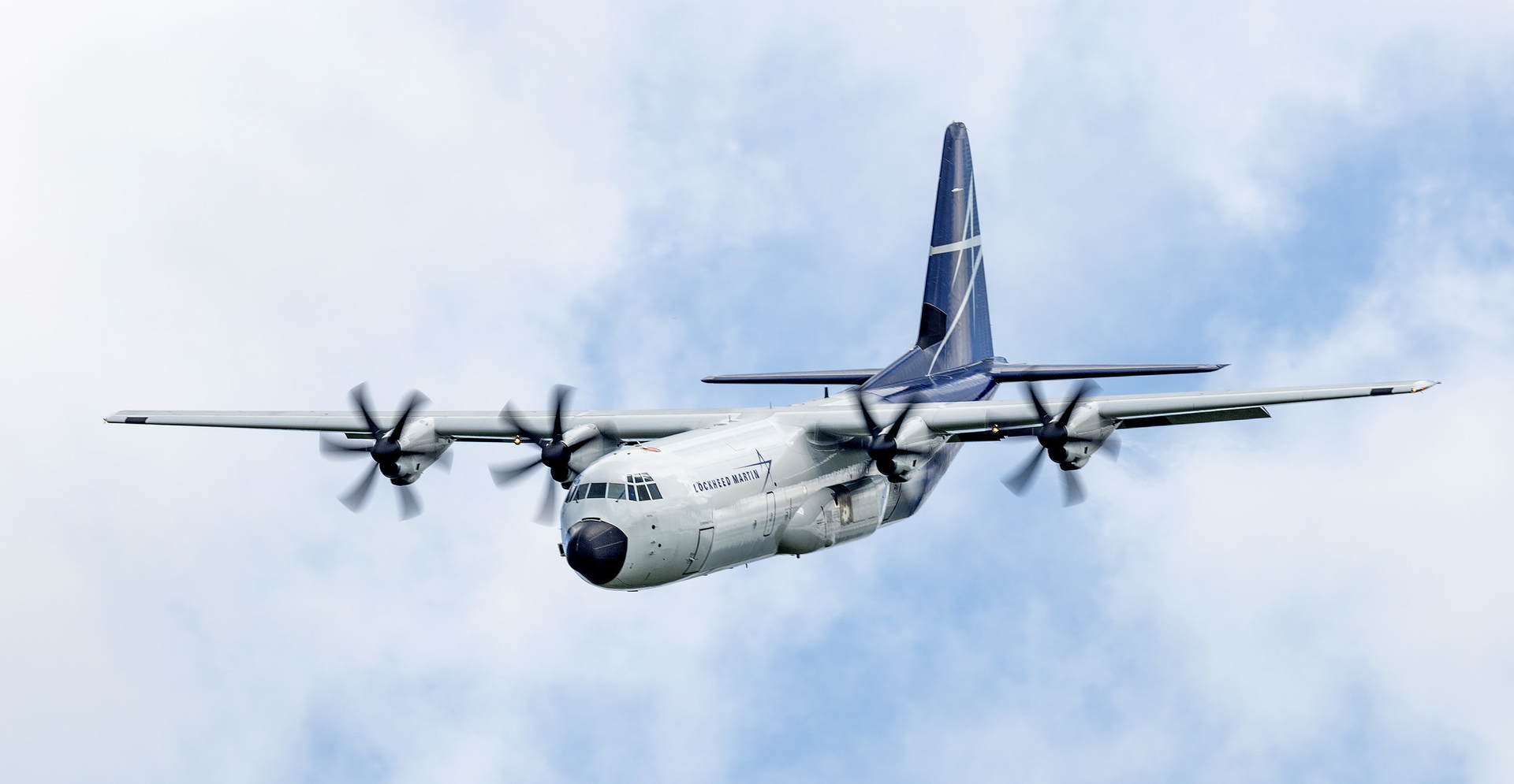 Lockheed Martin's LM-100J flies a Farnborough International Airshow practice run July 2.