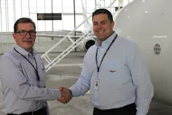 New King Aerospace Commercial Corporation General Manager (left) shakes hands with company President Jarid King. New King Aerospace Commercial Corporation General Manager (left) shakes hands with company President Jarid King.