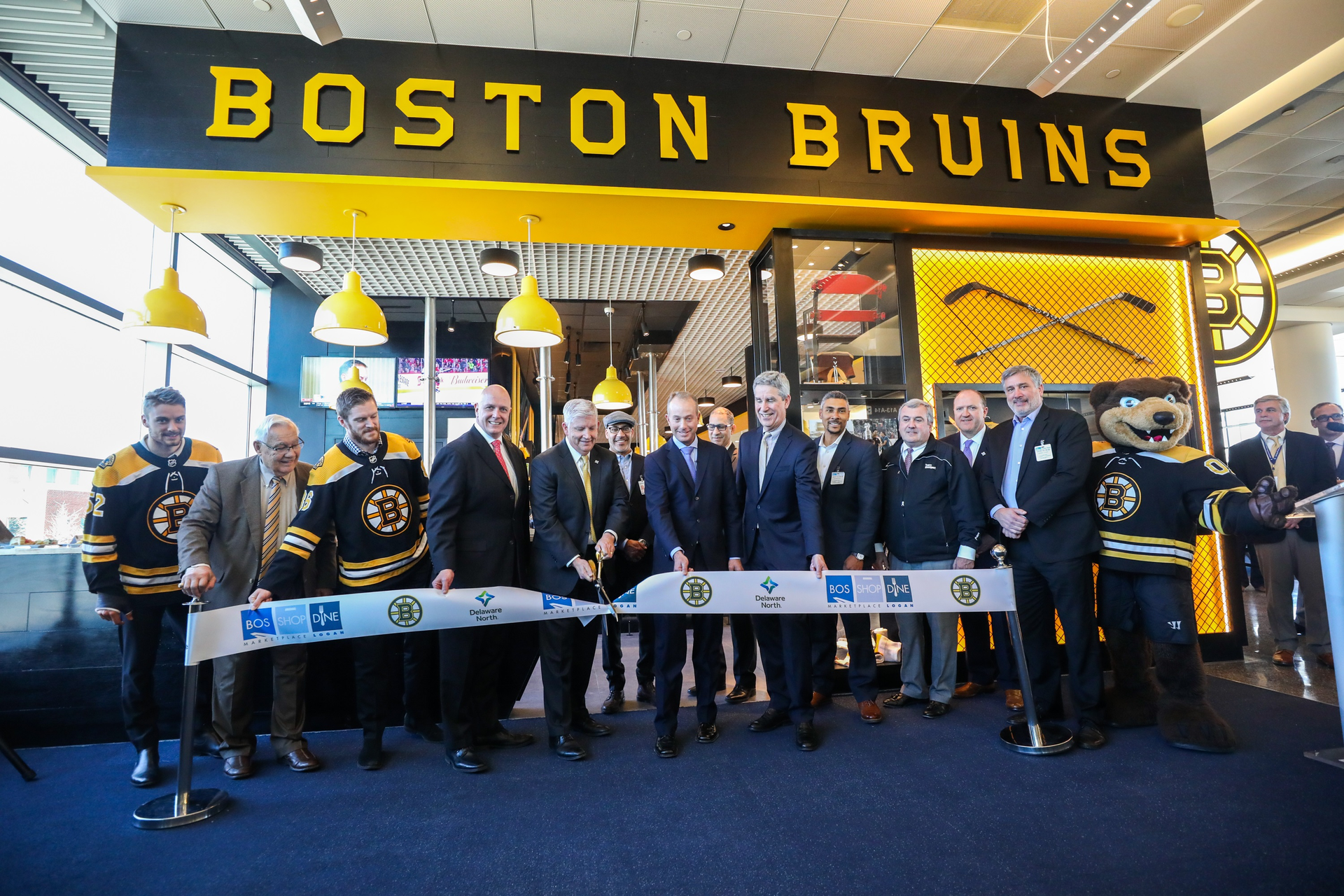 Bruins Bar Ribbon Cutting 5c9be5a0ea3b2