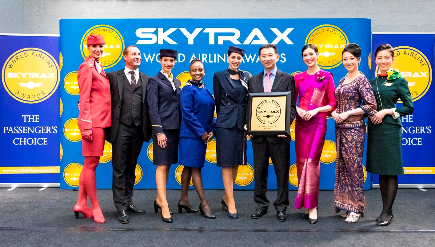 Star Alliance CEO Jeffrey Goh flanked by member airlines cabin crew