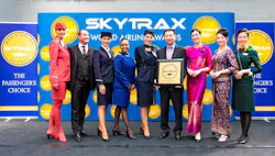 Star Alliance CEO Jeffrey Goh flanked by member airlines cabin crew Star Alliance CEO Jeffrey Goh flanked by member airlines cabin crew