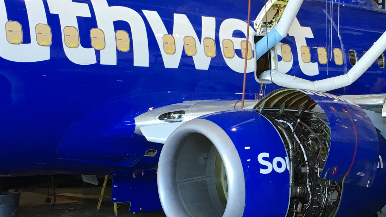 Aircraft Undergoing Maintenance Inspection 5d2debf549f1f