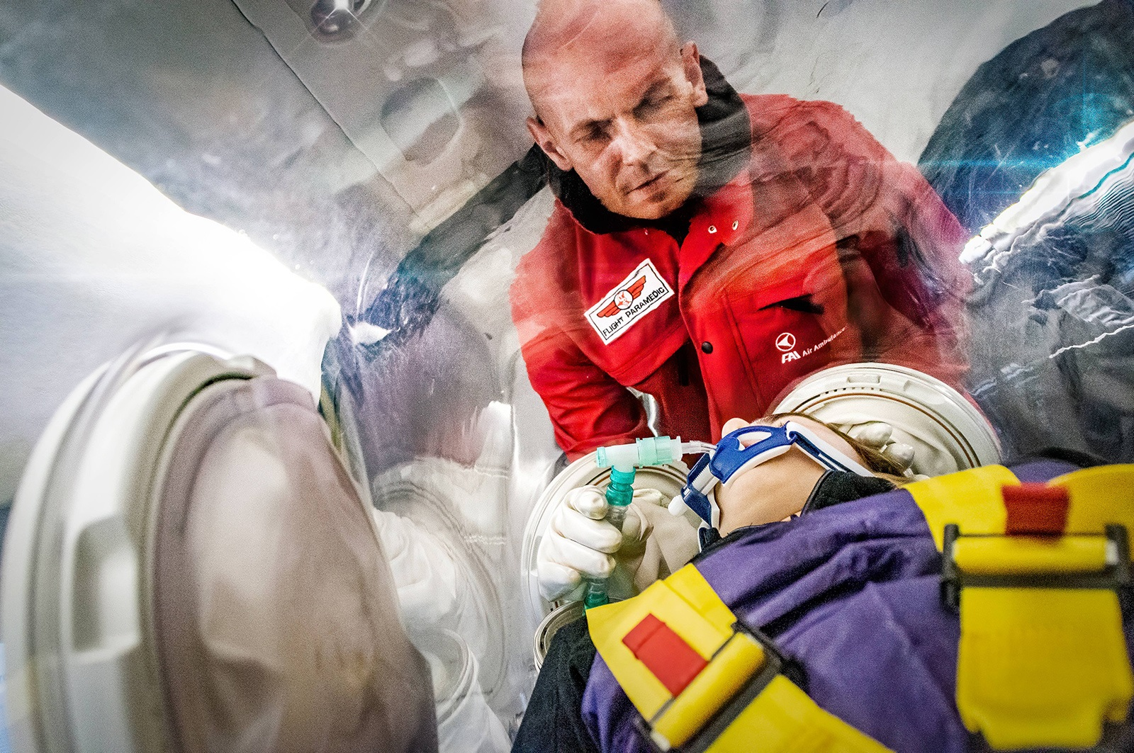 FAI transports COVID-19 patients using EpiShuttle portable medical isolation unit.