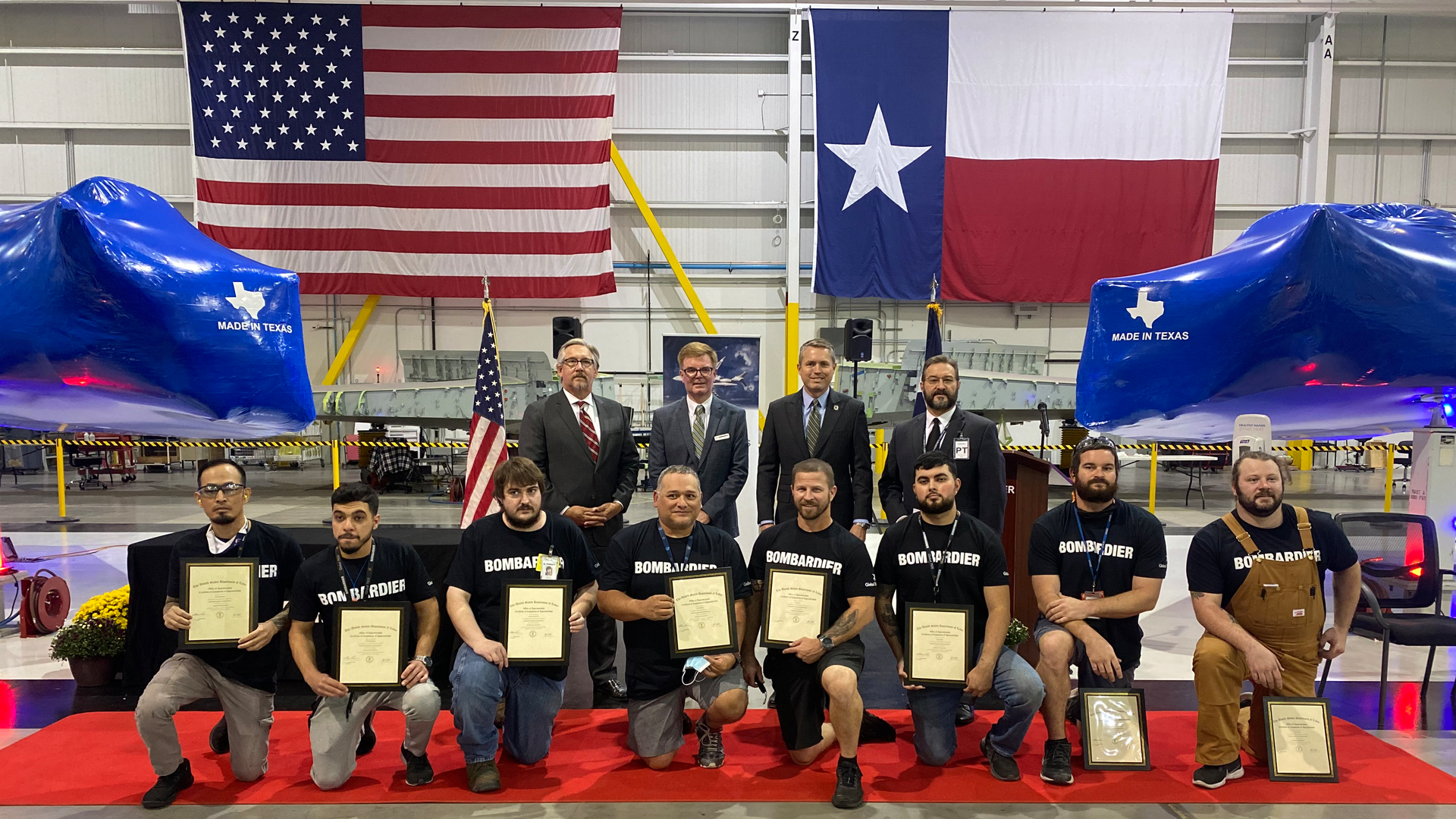 From left: Bryan Daniel, Chairman Texas Workforce Commission (TWC); Tony Curry, General Manager, Bombardier Red Oak facility; Rep. Brian Harrison, Texas State Representative (District 10); and John Kuznar, U.S. Department of Labor, joining the 10 apprentices graduating from Bombardier&rsquo;s BAAP program.