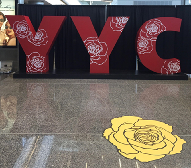 The #NotInMyCity yellow rose at the Calgary International Airport.