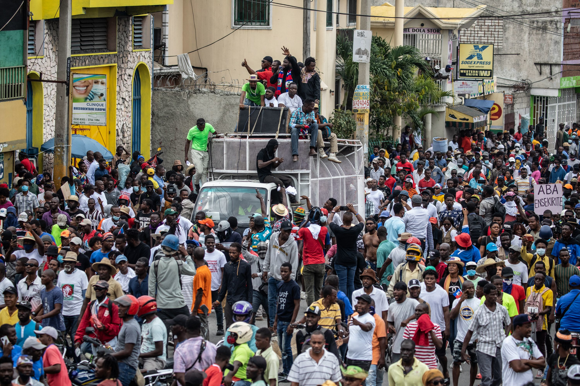 Haitians take to the streets to protest over the increasing insecurity in the Haitian capital Port-au-Prince, on Tuesday, March 29, 2022.