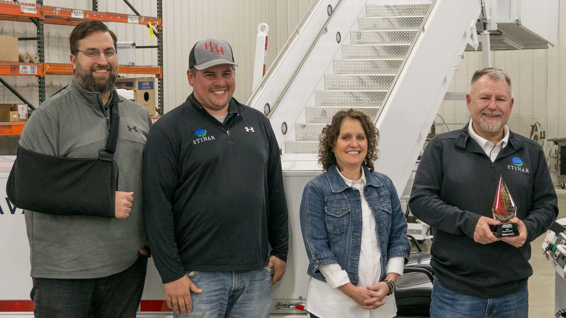 From left, Jason Johnson, VP of business development; Brandon Haubenschild, production manager; Amy Hinzmann, CFO/COO; and Craig Kruckeberg, CEO/CVO, accepted Stinar&rsquo;s Product Leader of the Year recognition.