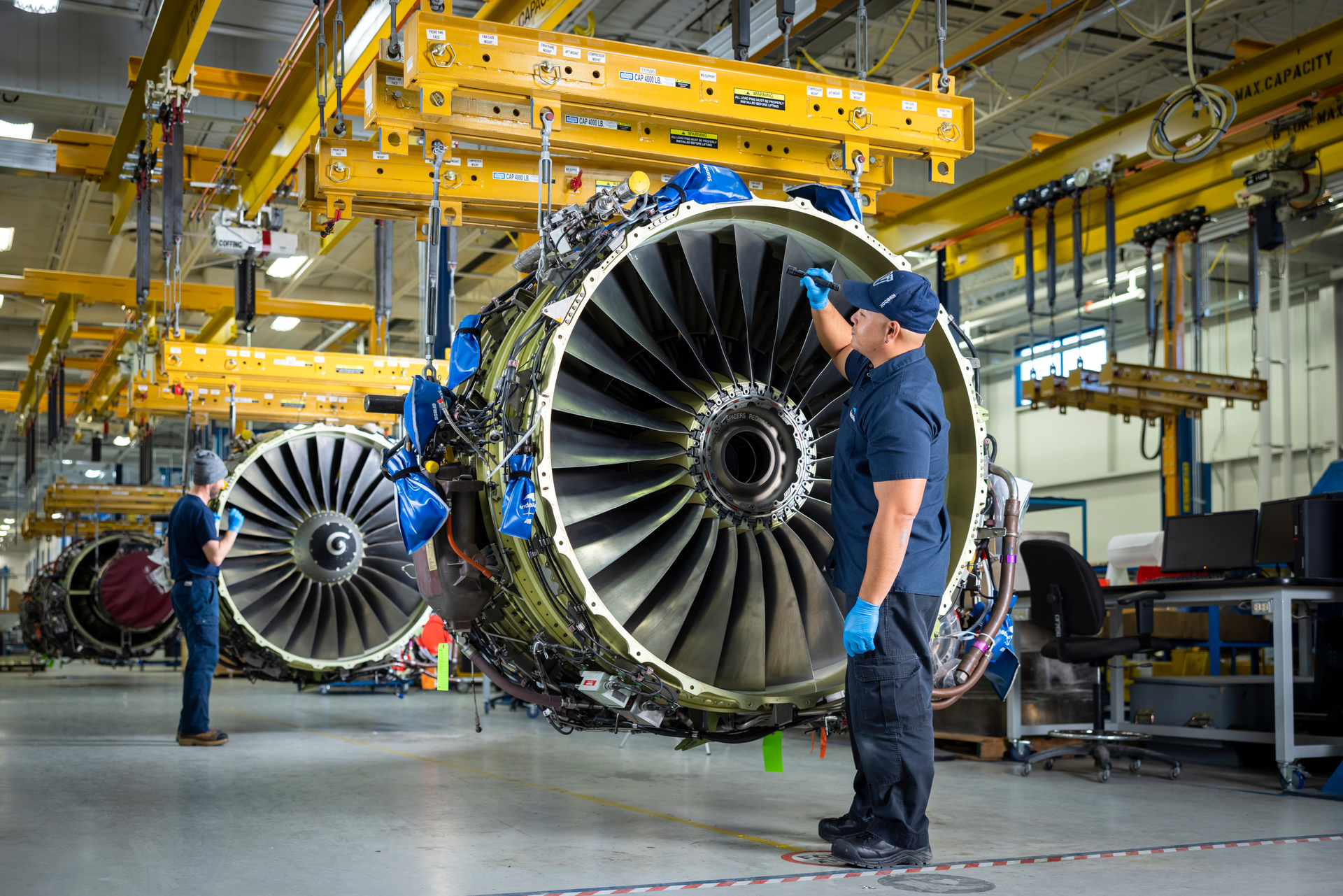 StandardAero technicians work on a CFM56 engine in the Winnipeg MRO facility.