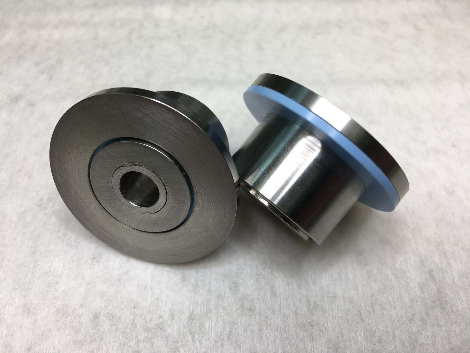 A King Air flap roller left with a AeroTough GF thermoplastic polymer bearing from Marsh Brothers Aviation