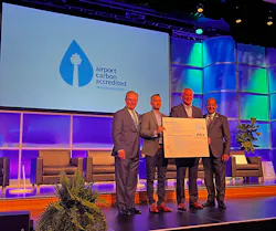 Phoenix Sky Harbor International Airport was presented with a Level 4 rating in the Airport Carbon Accreditation Program. Pictured here from left to right: ACI-NA President and CEO Kevin Burke, Phoenix Sky Harbor Assistant Chief Information Officer Daver Malik, Phoenix Sky Harbor Director of Aviation Services Chad Makovsky and ACI-NA Chairman and Kelowna International Airport Director Sam Samaddar. Phoenix Sky Harbor International Airport was presented with a Level 4 rating in the Airport Carbon Accreditation Program. Pictured here from left to right: ACI-NA President and CEO Kevin Burke, Phoenix Sky Harbor Assistant Chief Information Officer Daver Malik, Phoenix Sky Harbor Director of Aviation Services Chad Makovsky and ACI-NA Chairman and Kelowna International Airport Director Sam Samaddar.