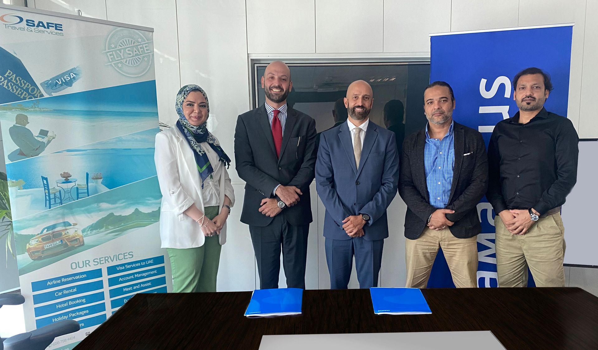 Photo includes Ernesto Sanchez Beaumont (in the middle of the photo) managing director, Amadeus Gulf; Raed Baidas (second from left), general manager of Safe Travel & Services; along with the Amadeus Gulf sales team Abu Dhabi.