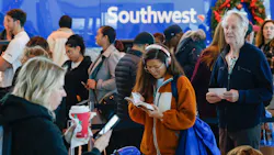 Ketmany Rasasack reads as she waits in line to reach a Southwest Airlines ticket counter at Dallas Love Field Airport on Tuesday. Rasasack s original flight was canceled the day before. Ketmany Rasasack reads as she waits in line to reach a Southwest Airlines ticket counter at Dallas Love Field Airport on Tuesday. Rasasack s original flight was canceled the day before.