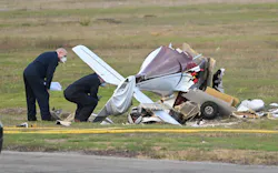 Torrance, California November 30, 2022-Investigators look over a plane that crashed and killed two people at Torrance Airport Wednesday morning. Torrance, California November 30, 2022-Investigators look over a plane that crashed and killed two people at Torrance Airport Wednesday morning.