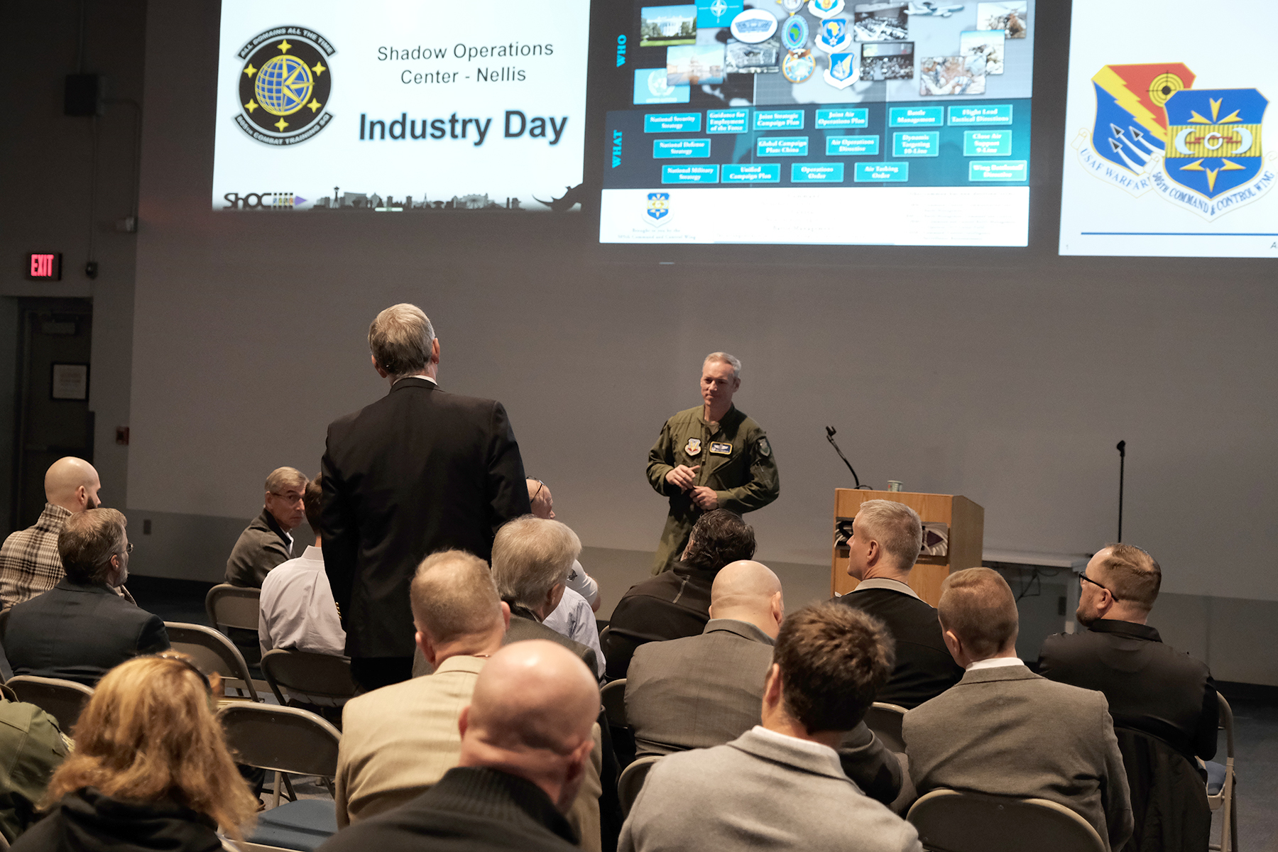Col. Frederick Coleman, 505th Command and Control Wing commander, speaks at the 805th Combat Training Squadron, also known as the Shadow Operations Center-Nellis, or ShOC-N, Industry Open House highlighting the Air Force's Battle Lab ability to provide a low barrier to entry, access to data, and an opportunity for feedback from operators for C2-interested companies at Nellis Air Force Base, Nevada, Dec. 9, 2022. The event included more than 120 traditional and non-traditional industry experts who were briefed by the 505th Command and Control Wing and ShOC-N leaders about the needs for advanced C2 capabilities and to create shared awareness to continue accelerating C2 processes.