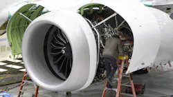 A Boeing employee works on the engine of a 737 MAX on the final assembly line at Boeing’s Renton plant in June. About 40% of the 374 MAX deliveries in 2022 were of jets taken out of long-term storage and reworked. About 230 rolled out new from the Renton assembly line. A Boeing employee works on the engine of a 737 MAX on the final assembly line at Boeing’s Renton plant in June. About 40% of the 374 MAX deliveries in 2022 were of jets taken out of long-term storage and reworked. About 230 rolled out new from the Renton assembly line.