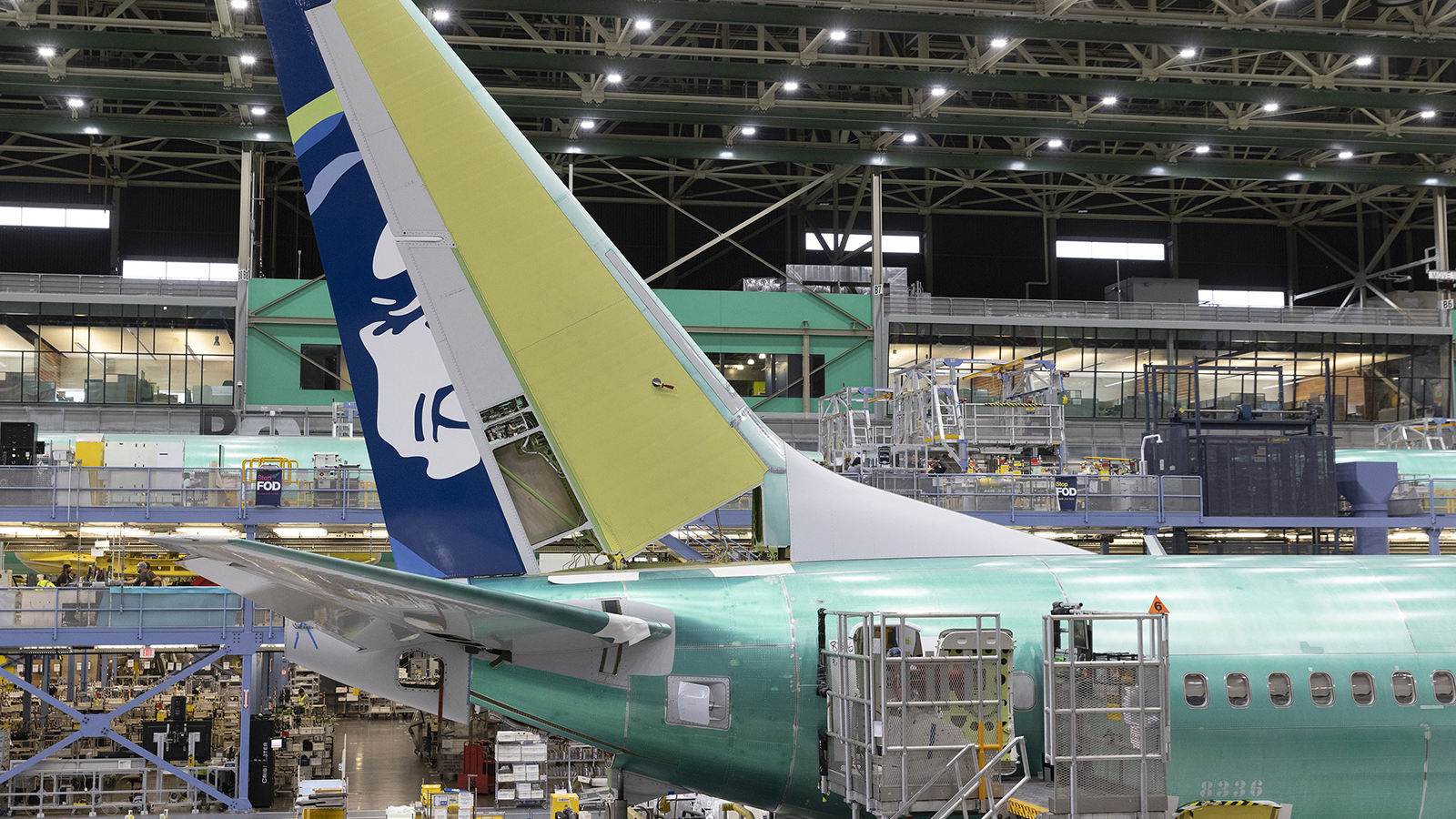 Boeing employees work on the 737 MAX on the final assembly line at Boeing's Renton plant, June 15, 2022, in Washington.