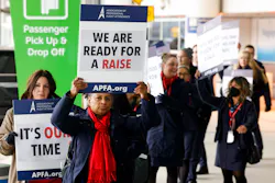 American Airlines flight attendants and members of the Association of Professional Flight Attendants picket over stalled contract negotiations on Tuesday, Jan. 24, 2023, outside of Terminal D at DFW International Airport. American Airlines flight attendants and members of the Association of Professional Flight Attendants picket over stalled contract negotiations on Tuesday, Jan. 24, 2023, outside of Terminal D at DFW International Airport.