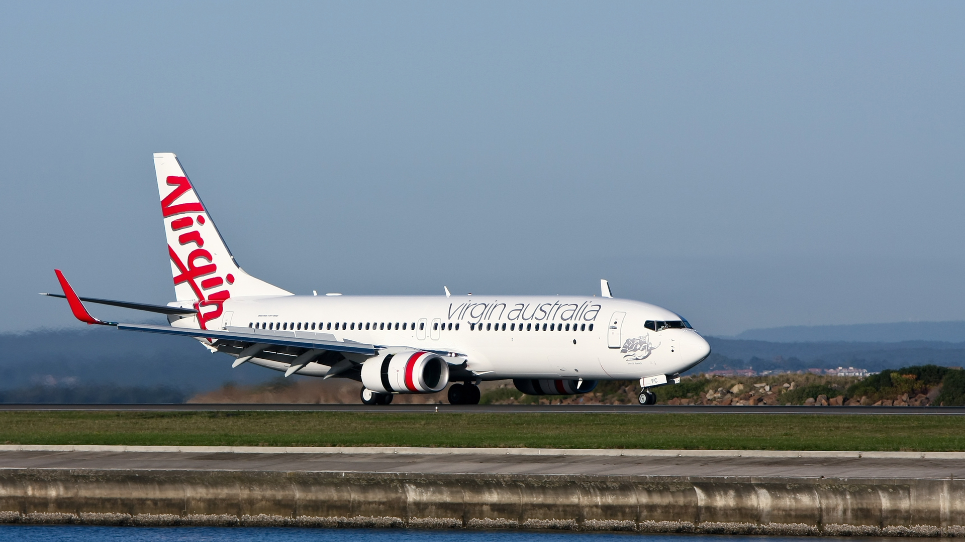 A Virgin Australia Airlines Boeing 737 jet on a runway, May 7, 2011, in Sydney.