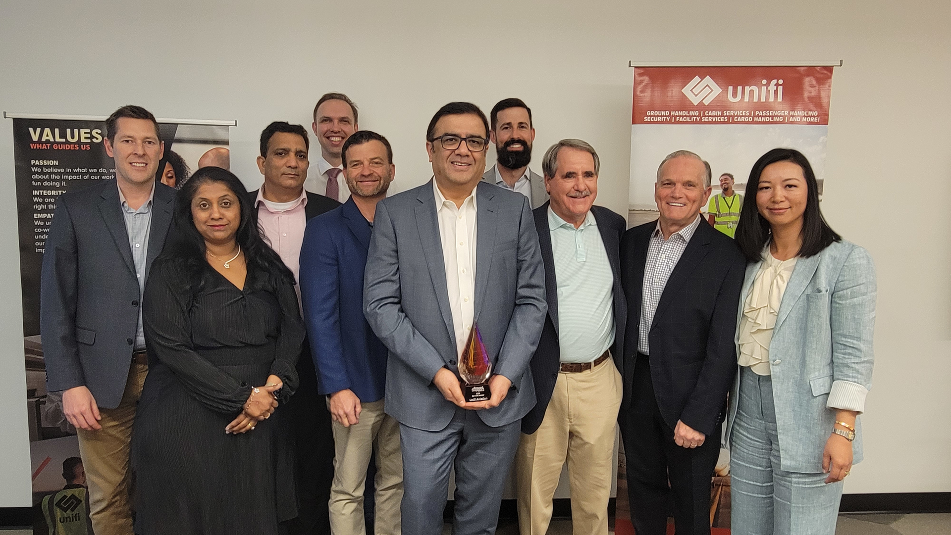 Unifi's corporate leadership team includes (from left) Brian Bartal - SVP, safety and compliance, Archana Arcot - chief people officer, Sandeep Angra - chief technology officer, Henk Teunis - chief financial officer, Eddie Russell - CEO, ERMC Aviation, Gautam Thakkar - CEO, Brian Stillwagon - general counsel, Don Ridgeway - chief customer officer, Greg Kennedy - chief operating officer, and Ying McPherson - chief commercial officer.